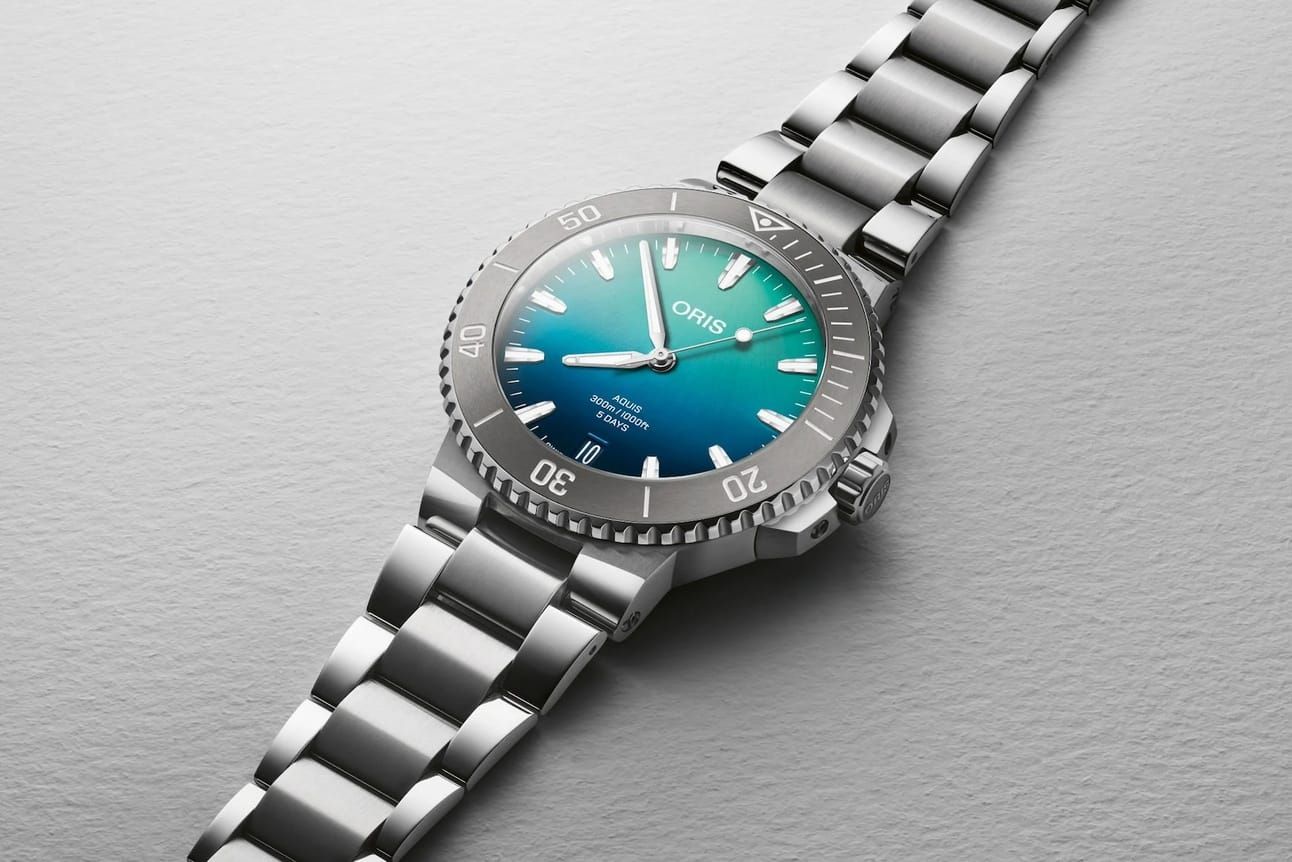 Oris Continues Reef Protection With Aquis Great Barrier Reef LE IV; Norqain Has Two New Glaciers; Monta Releases Noble GMT; Wimbledon-Themed MDM Rallymaster III; Louis Moinet's Metoerite Moonphase