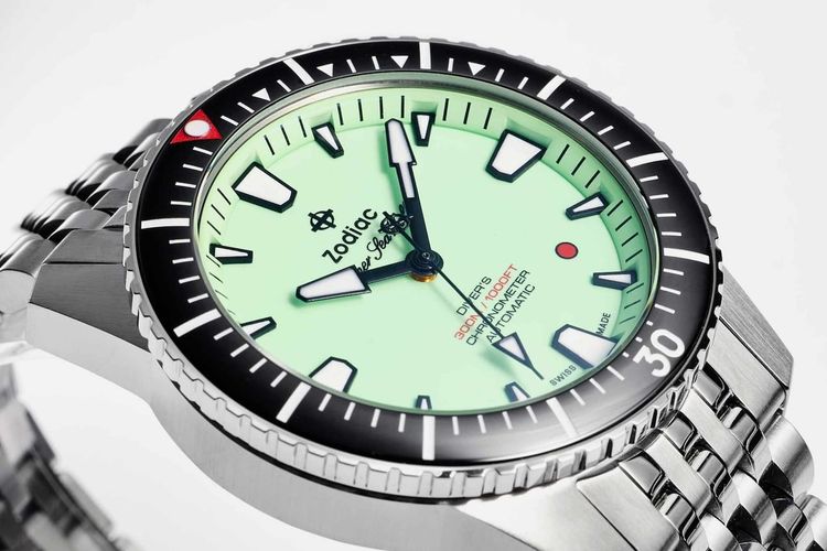 Zodiac Releases Fully Lumed Dial Super Sea Wolf; Nivada' Bronze Pac-Man Depthmaster; Depancel Unveils First Auto Chrono Série-R; Moser Brings Back Streamliner Centre Seconds In Green And Purple