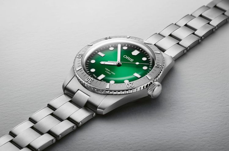 Oris Listens To Fans, Releases 38mm Divers Sixty-Five Calibre 400; Citizen's New Titanium Forza; Swatch Has Four Olympic Watches; Direnzo Relaunches DRZ 02R; Gerald Charles' Hammered Gold Dial