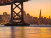 View from under the Bay bridge looking at downtown San Francisco at Sunset