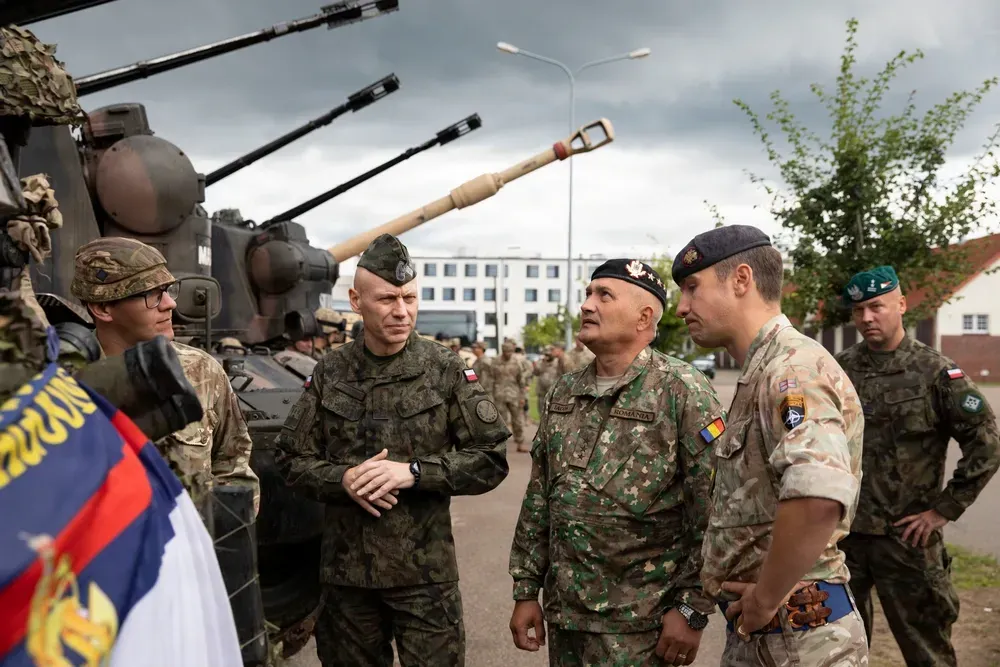 Romanian Defense Chief Reviews NATO Battle Group Training in Poland