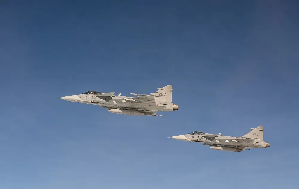 Swedish Air Force JAS 39 Gripen fighters during a NATO air defense mission