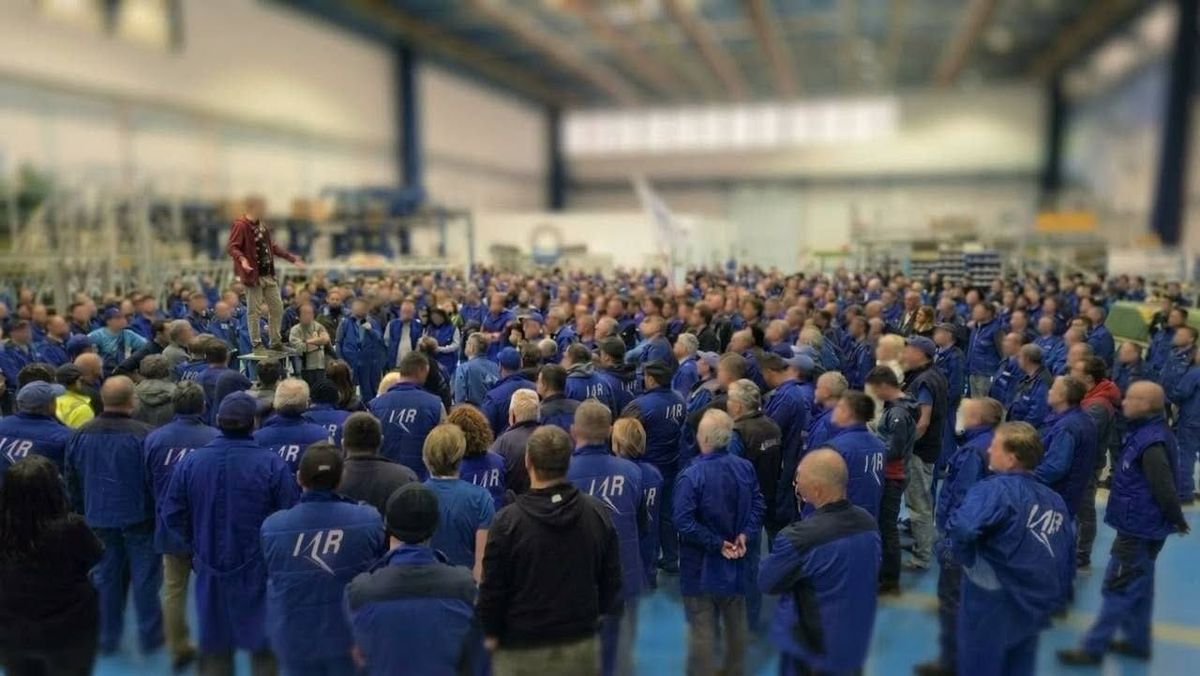 Workers protesting at the IAR Ghimbav helicopter factory in Romania over pay and industrial workload.