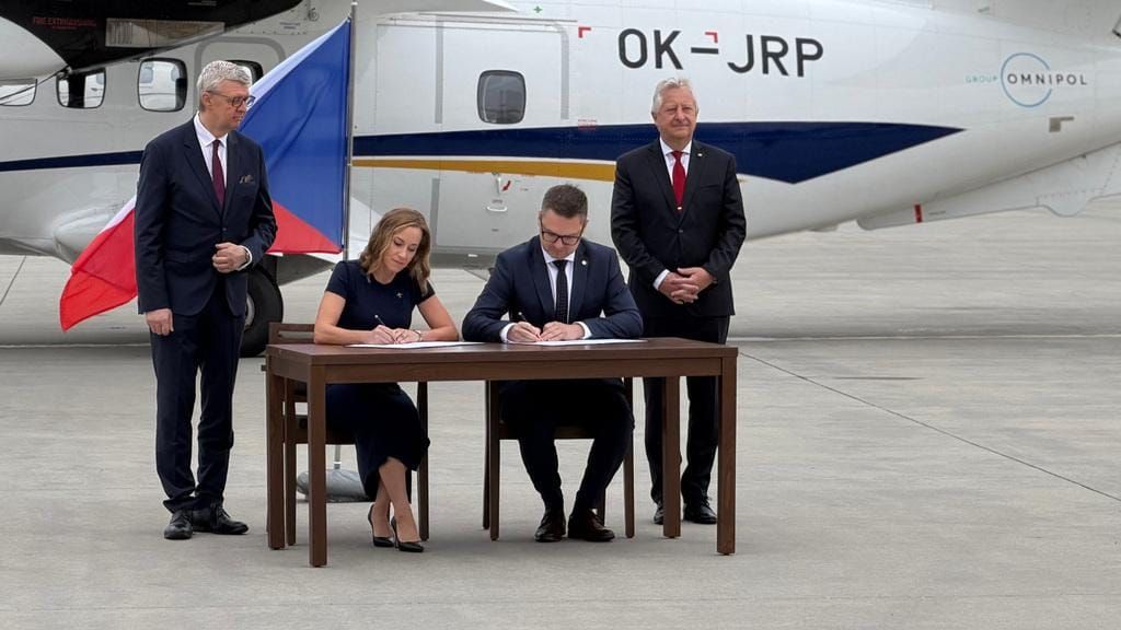 Indian and Czech representatives display signed agreements at an A-One Group defence and aerospace cooperation event in Bengaluru.