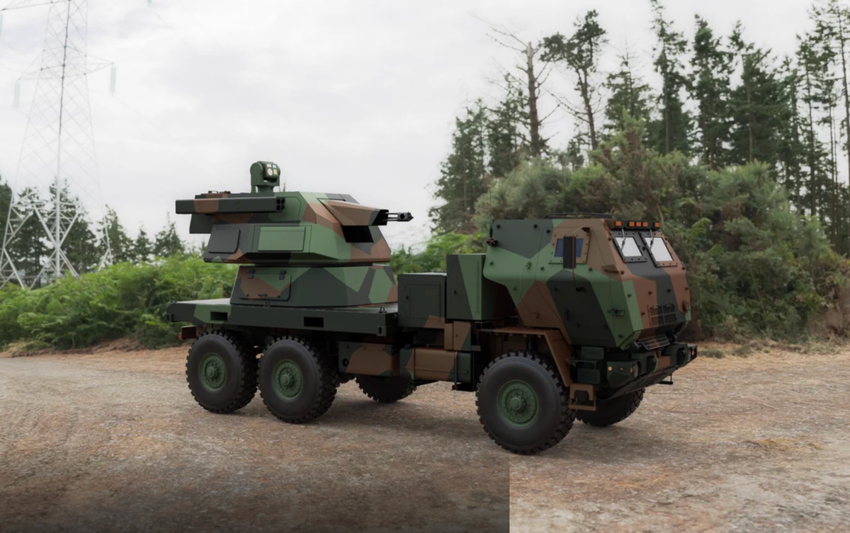 Slovenian Valhalla Turrets Skythunder counter-drone air defense concept with a 20 mm Gatling cannon mounted on a camouflaged 6×6 truck.