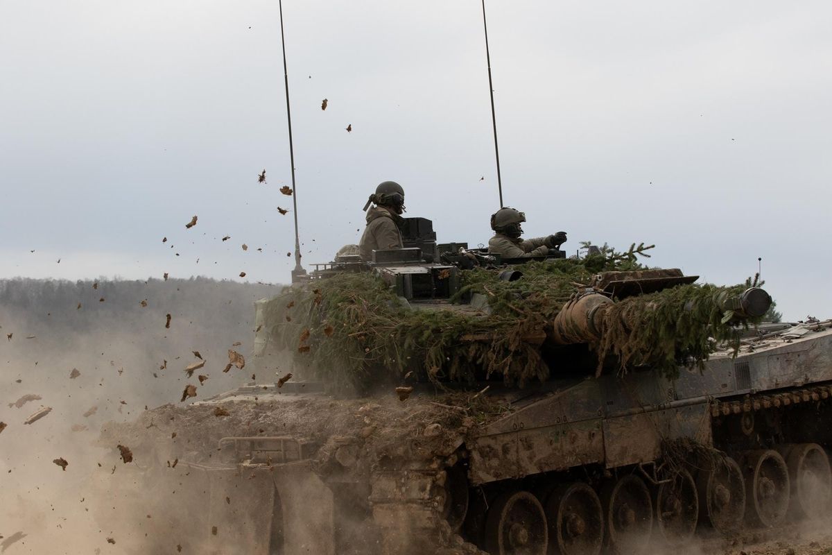 Leopard 2 tank maneuvering during a NATO military exercise in Germany.