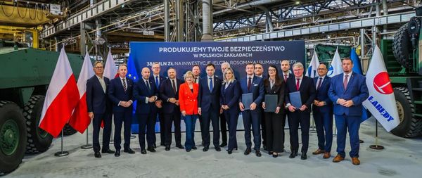 Polish government and PGZ representatives announce military vehicle manufacturing investments at the former Rafako industrial complex in Racibórz.