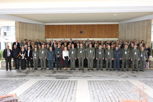 Officials and defense technology researchers at the OTEH 2026 scientific conference in Serbia.