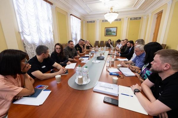 Ukrainian defense officials address representatives of the country's defense industry during a meeting on procurement and production priorities.