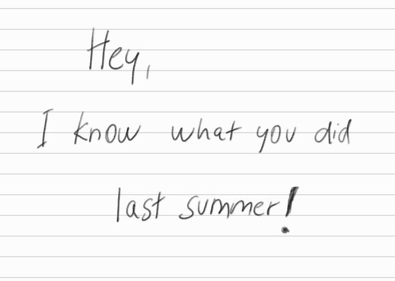 Handwritten note referencing a horror movie threat.