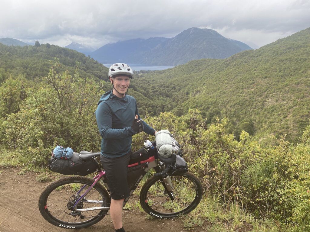 Man on bike giving thumbs up