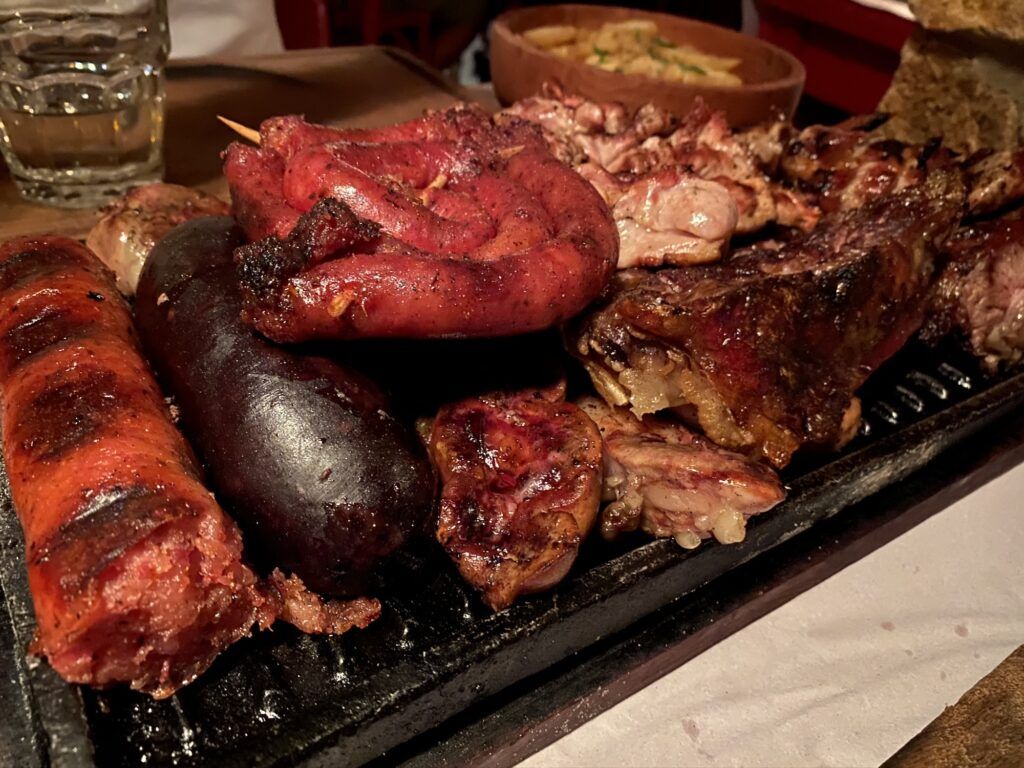 Grilled sausages and meat