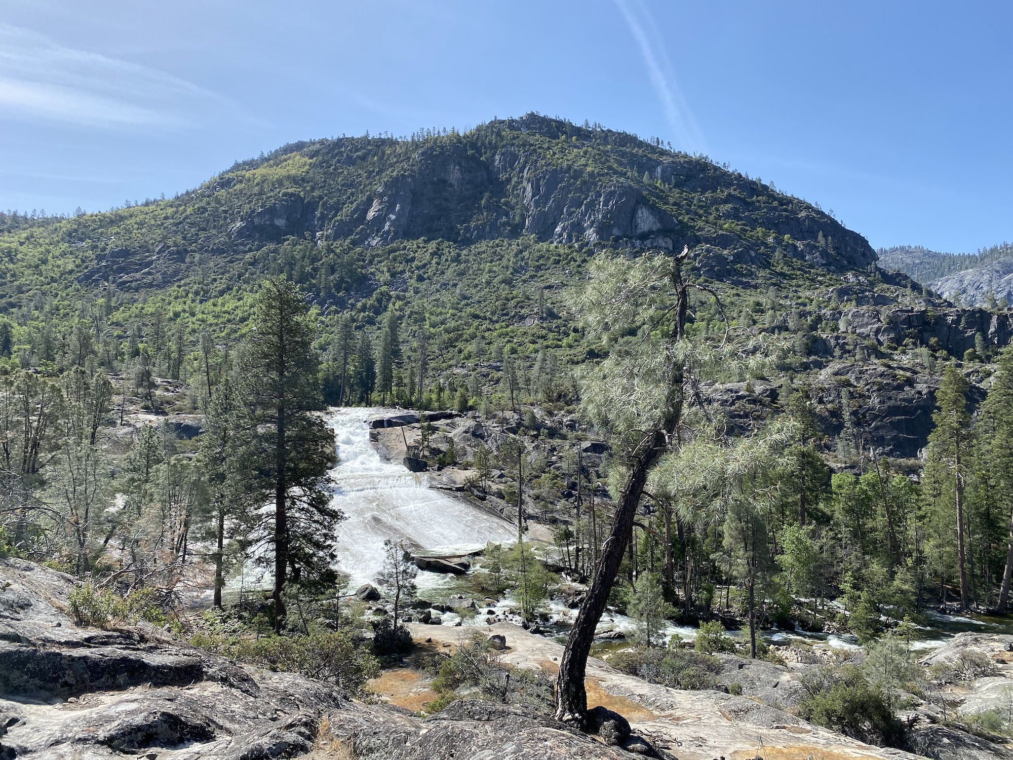 A wide waterfall flowing over rock