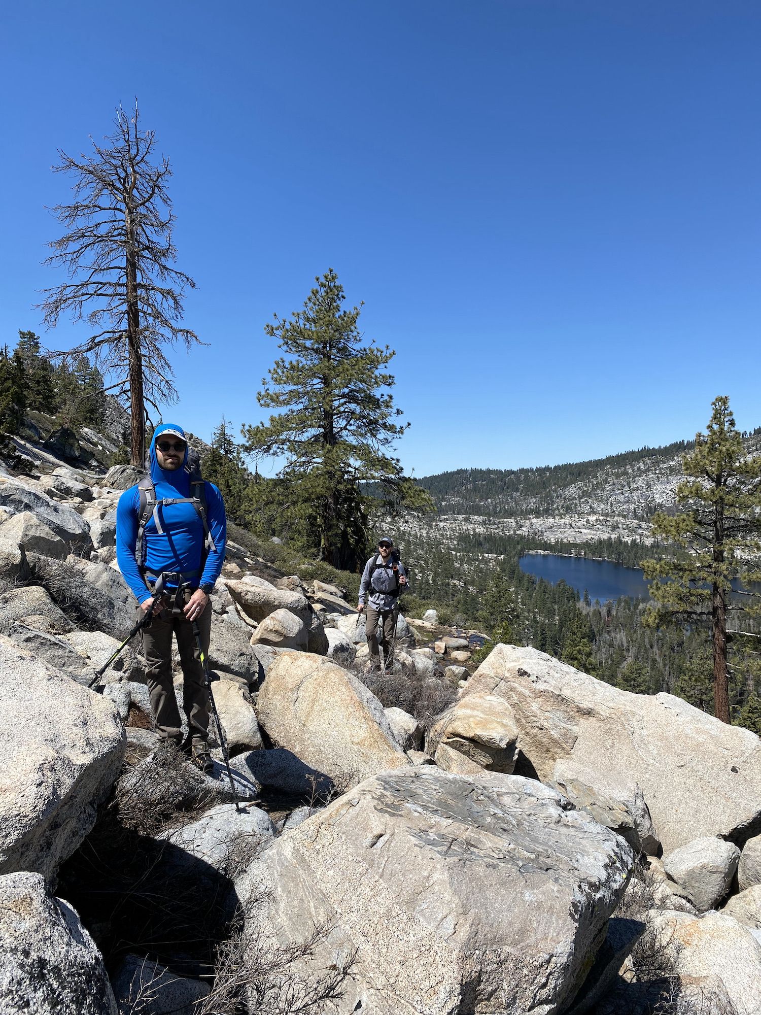 Two backpackers among boulders