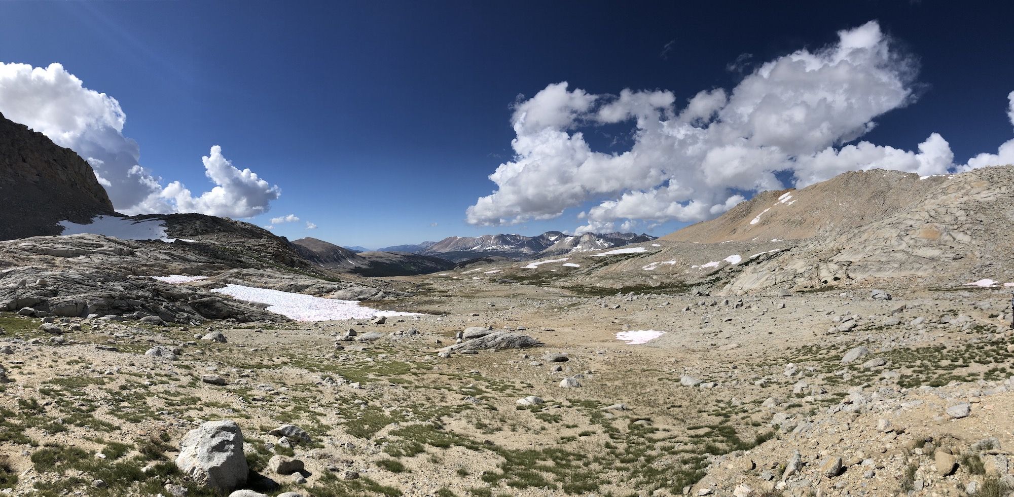 An open landscape with rocks and granite mountains. 