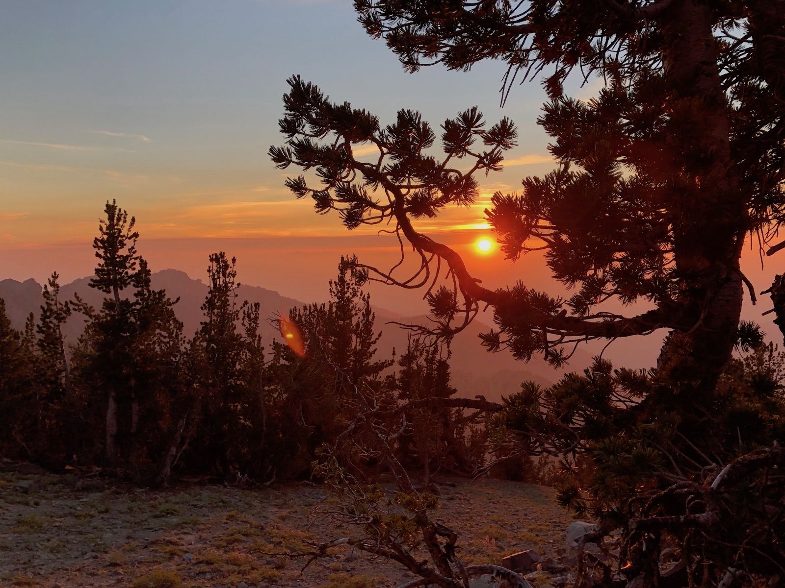 The sunset on Relay Peak was colored by smoke from wildfires.
