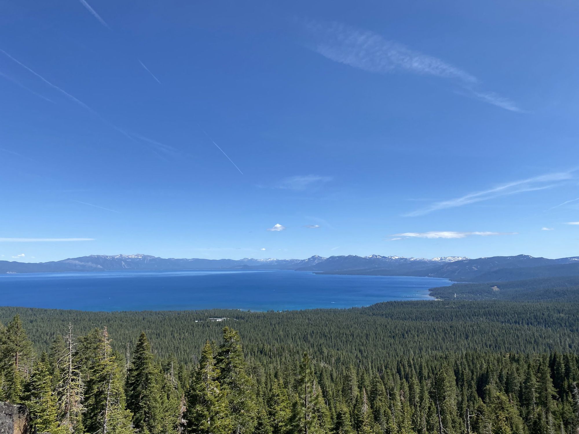A large blue lake surrounded by mountains