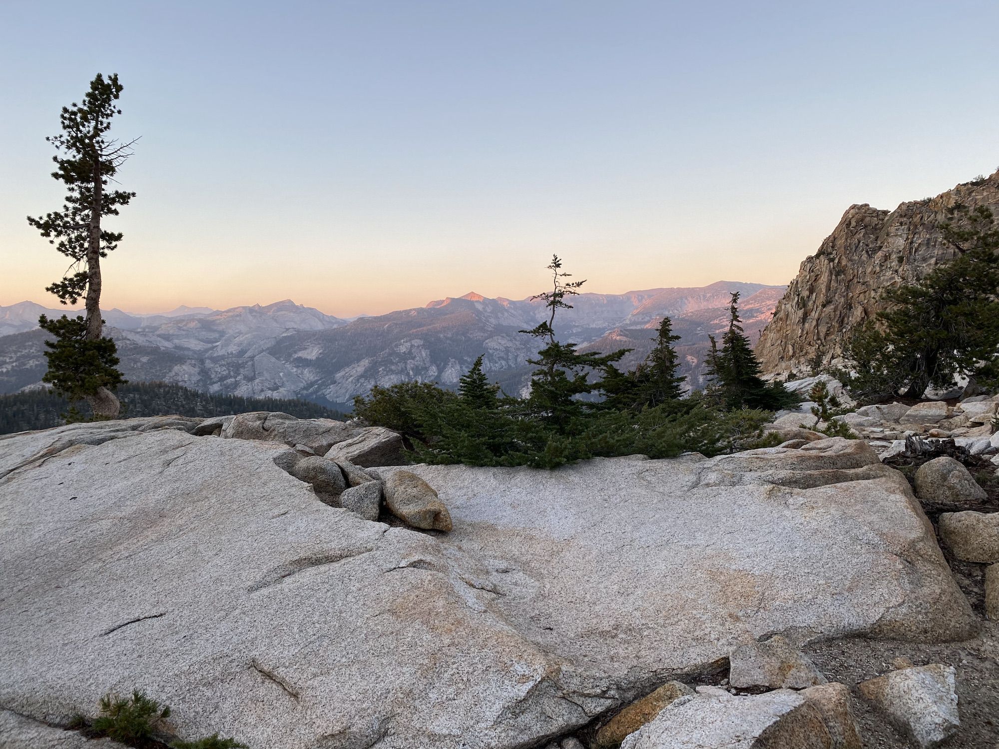 The last rays of the sun hitting the highest mountain peaks