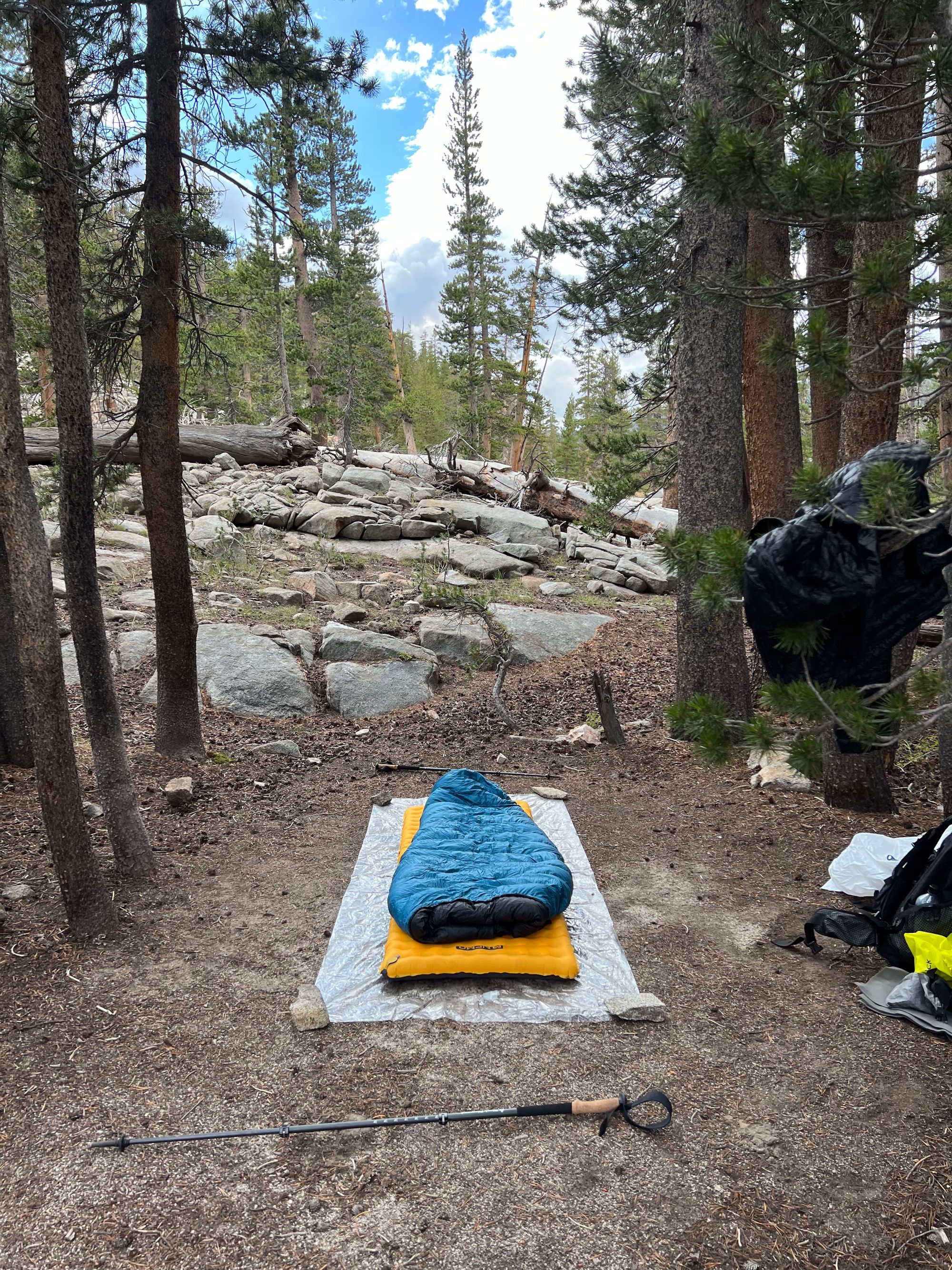 A quilt on a sleeping pad. 