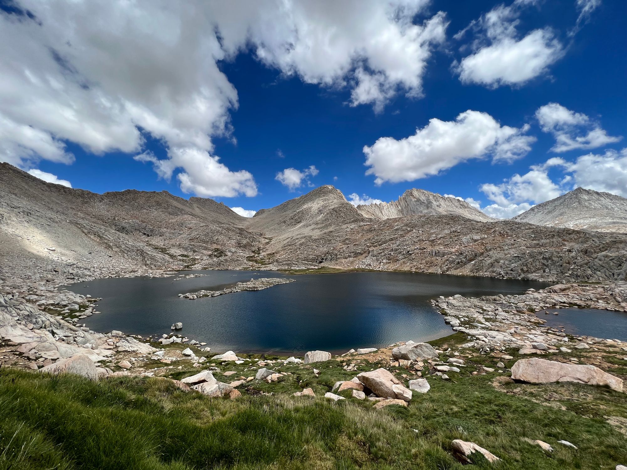 A large lake with an island in the middle.