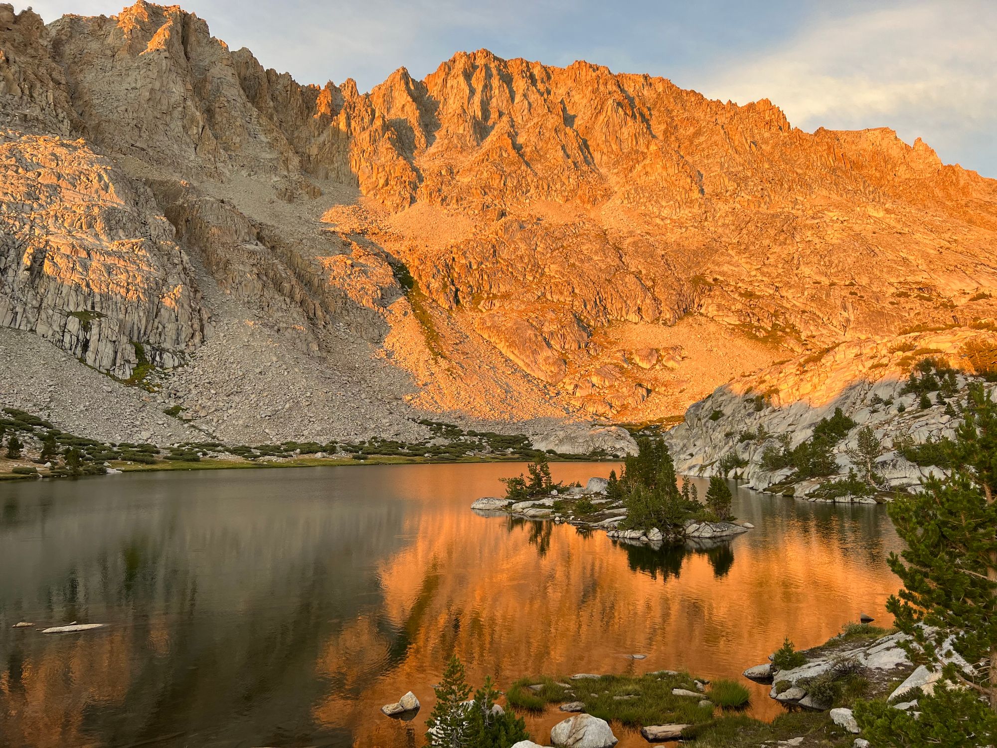 A mountain illuminated by the sunset. 