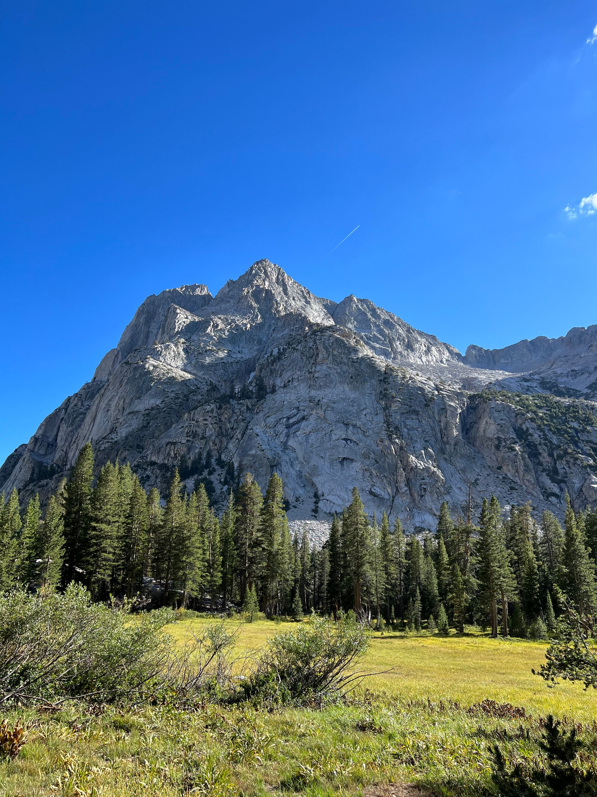 A mountain peak with almost vertical walls.