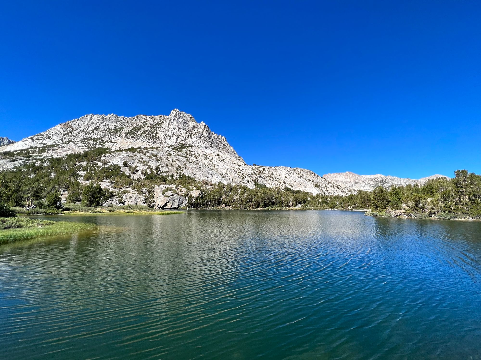 A mountain reflecting off a lake.