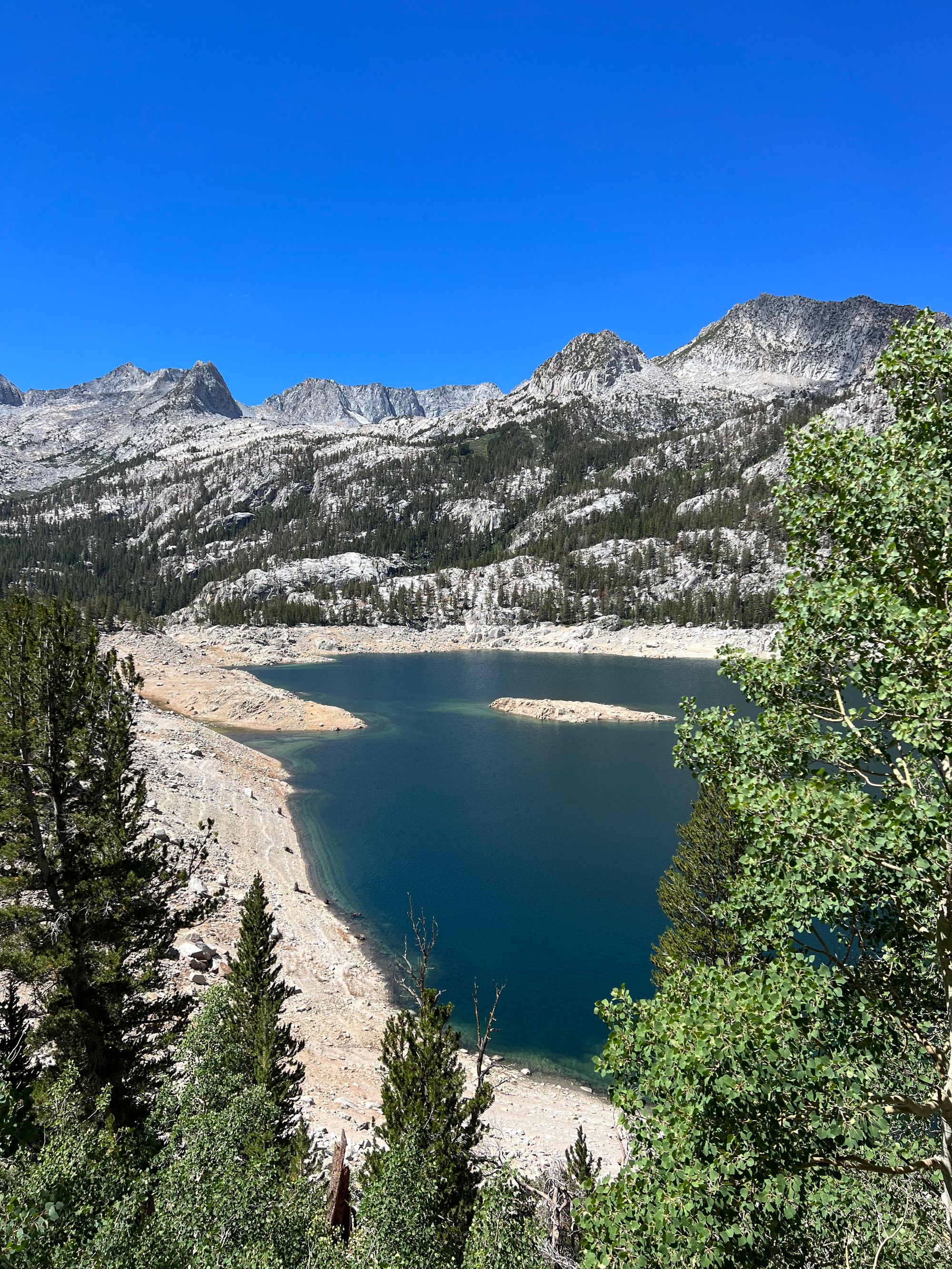 A reservoir. The water level is tens of feet below the high mark. 