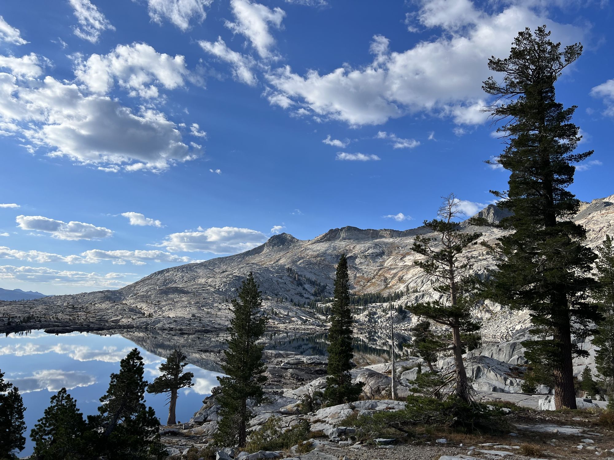 Bare granite mountains illuminated by morning light.