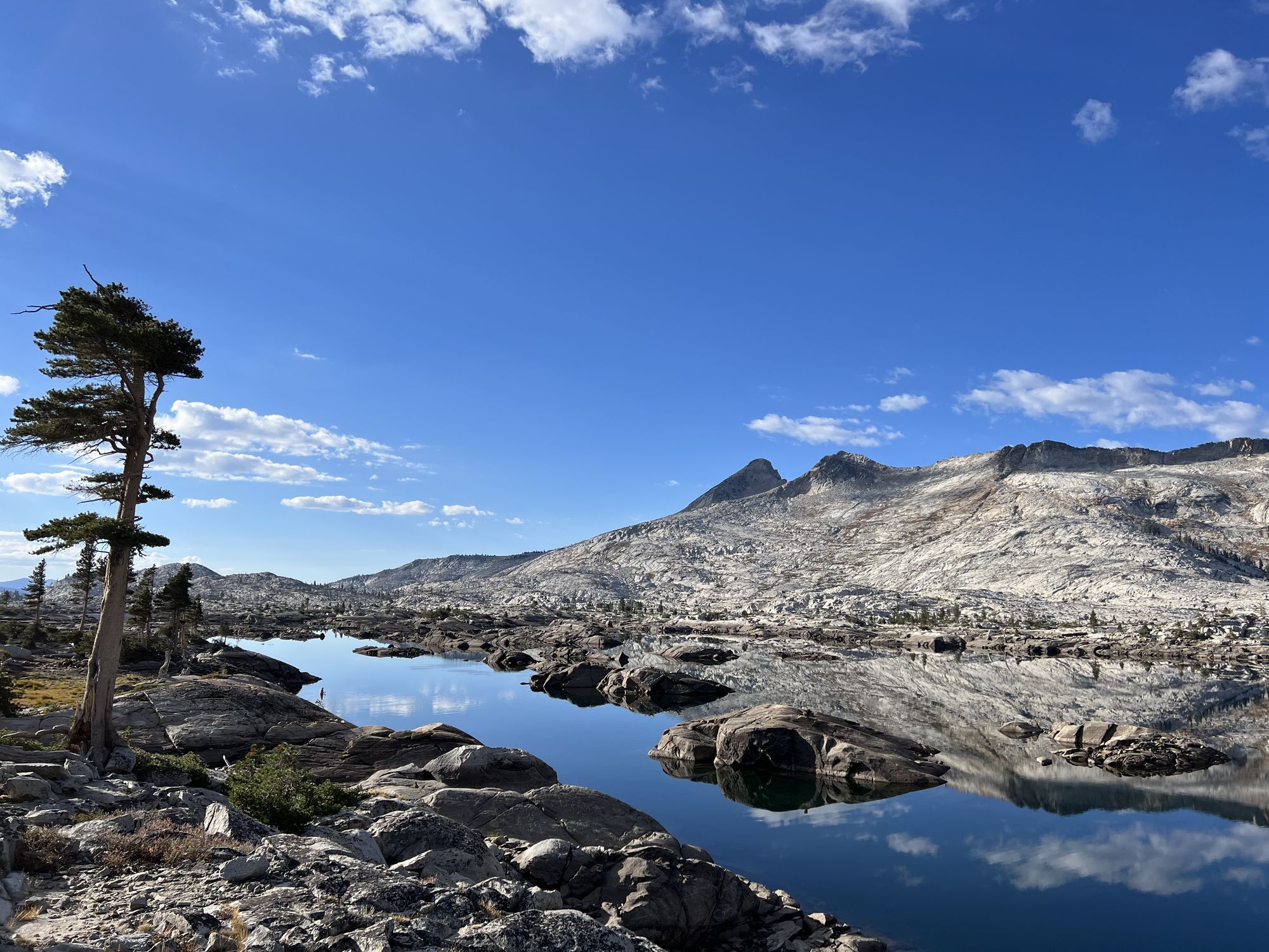 A lake dotted with tens of rocky islets.