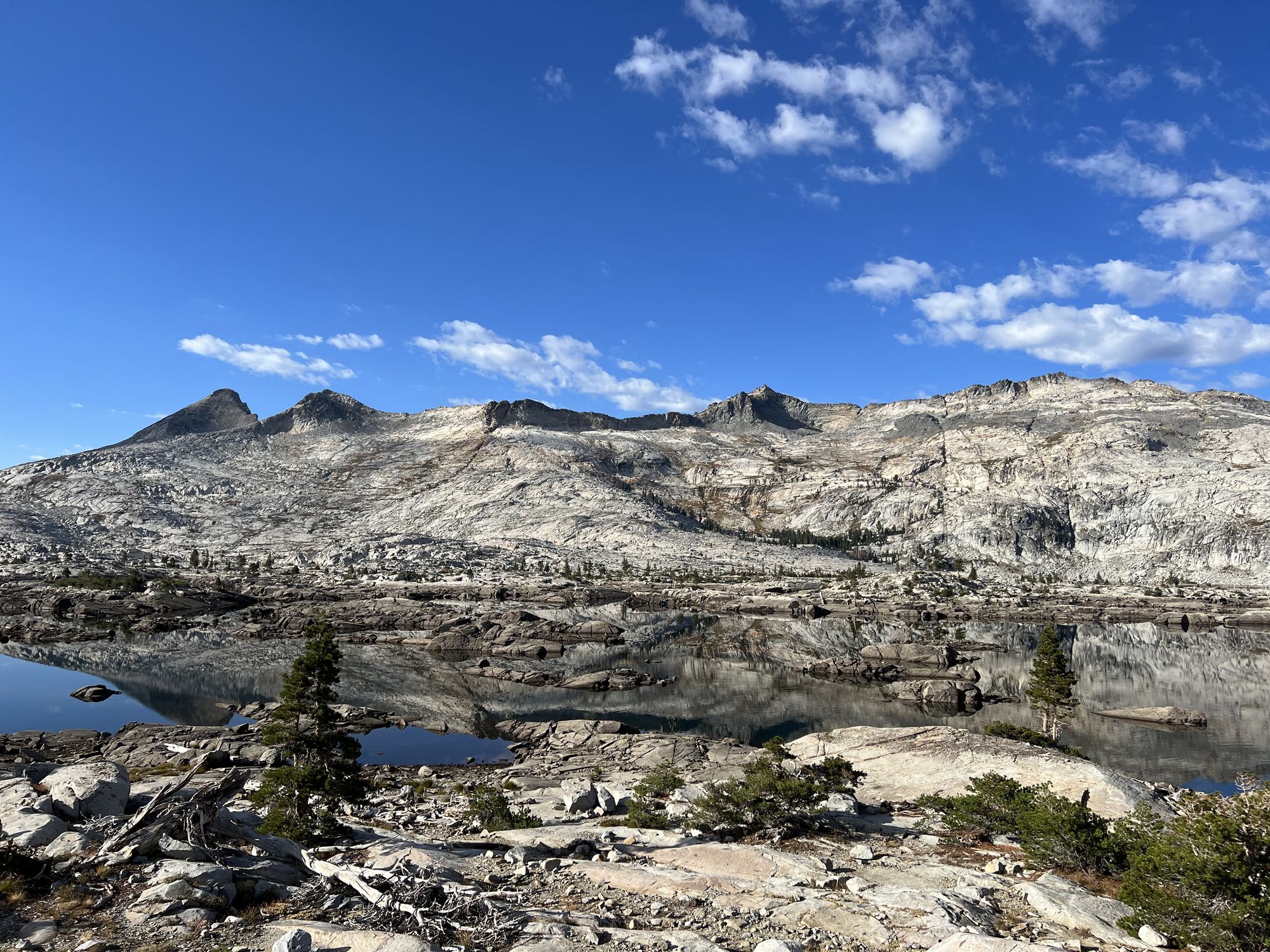 A rocky landscape with a lake.