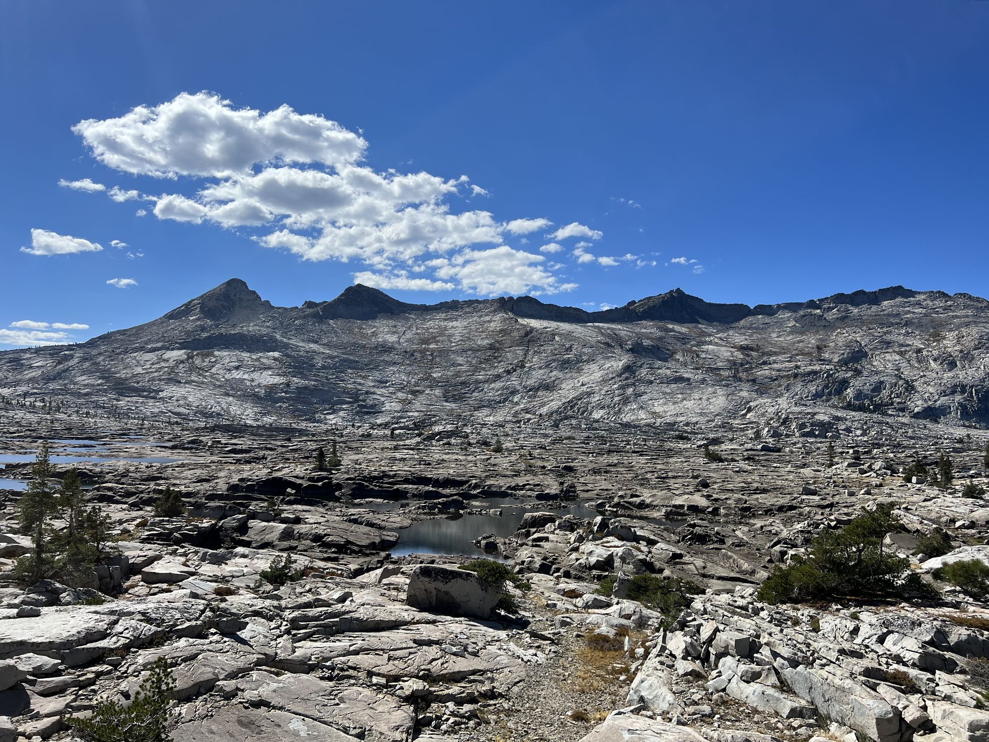 An expanse of bare granite lakebed.