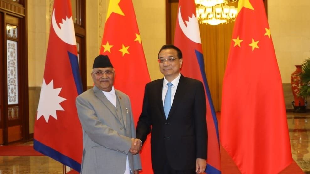 Then-PRC Premier (and now late) Li Keqiang welcomes Nepalese Prime Minister K. P. Sharma Oli