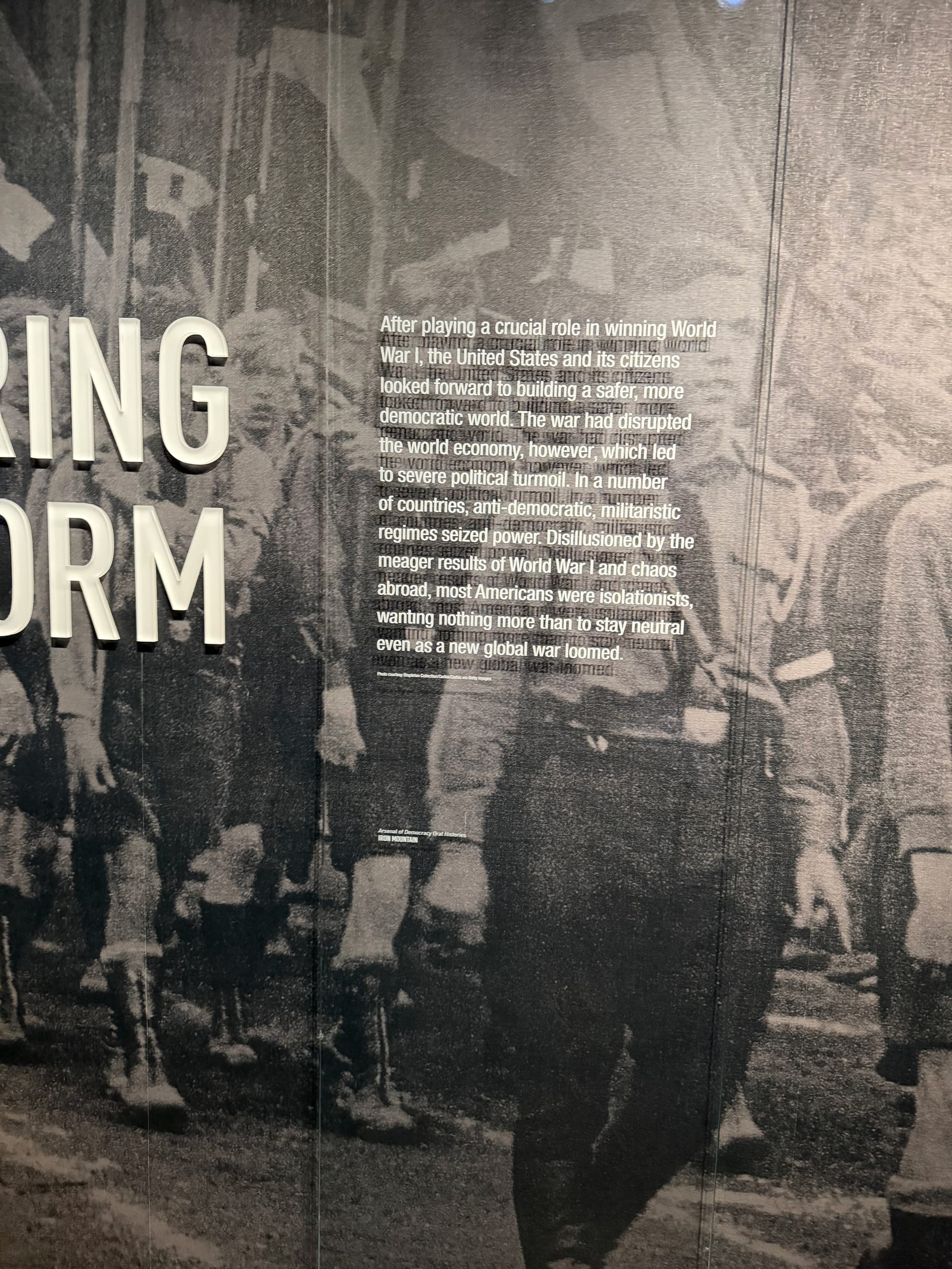 Museum wall text on isolationism and anti-democratic regimes seizing power after WWI