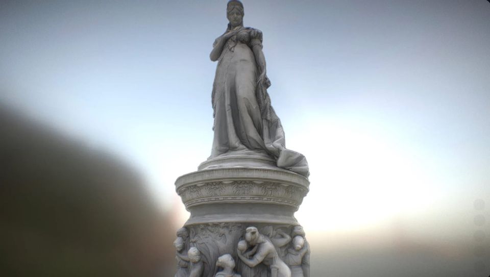 A hazy image of Queen Louise of Prussia Statue in Tiergarten, Berlin, from a slight low angle with blown out sunshine in the background.
