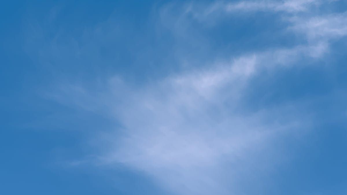 Photo of clouds shows how using Dr. John Sarno’s approach dissipates the stress and pain that can lead to burnout at work.