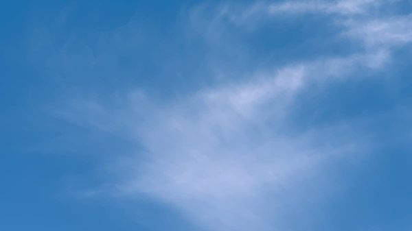 Photo of clouds shows how using Dr. John Sarno’s approach dissipates the stress and pain that can lead to burnout at work.