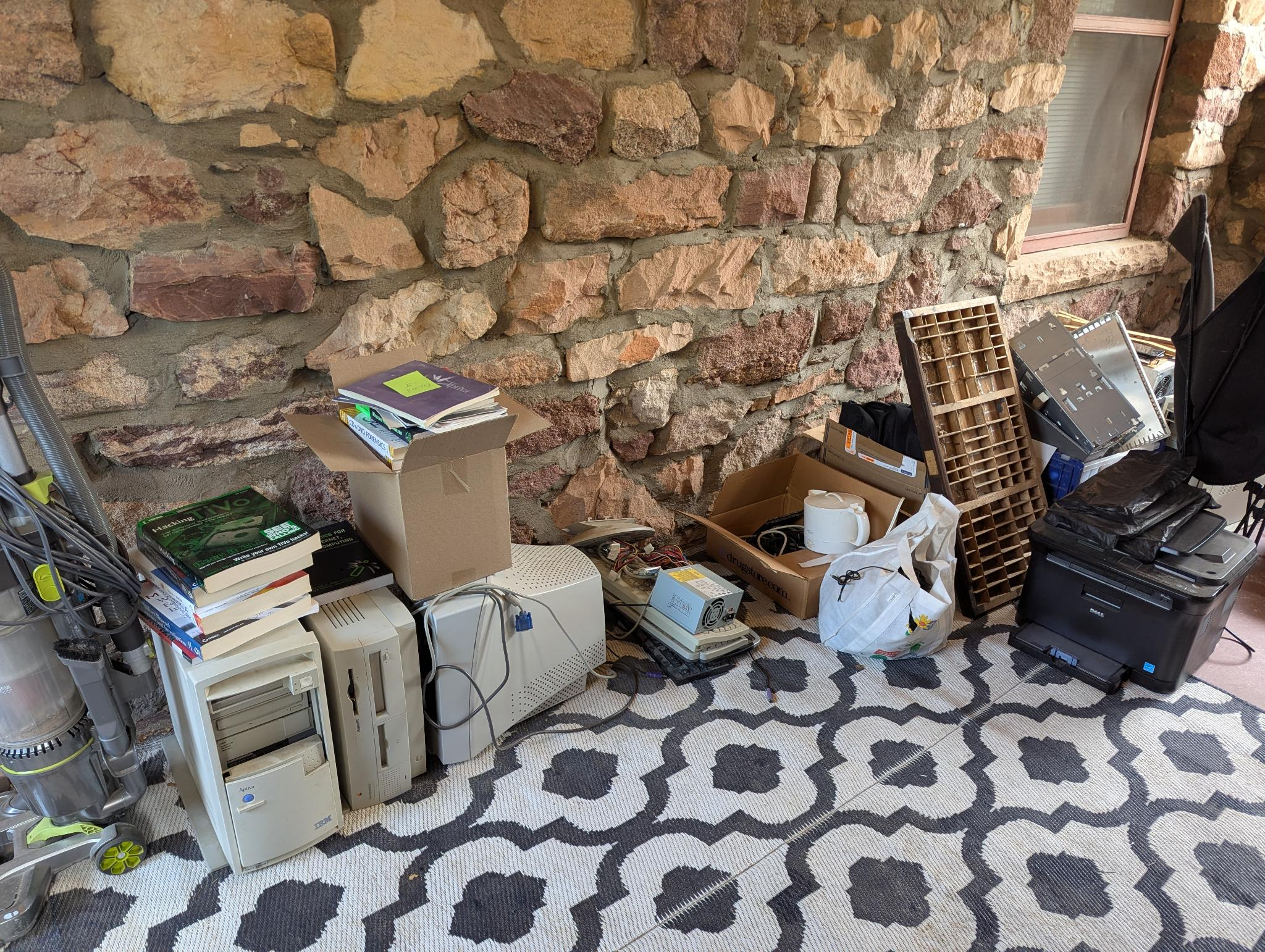 an assortment of things on the MAL porch, up for grabs