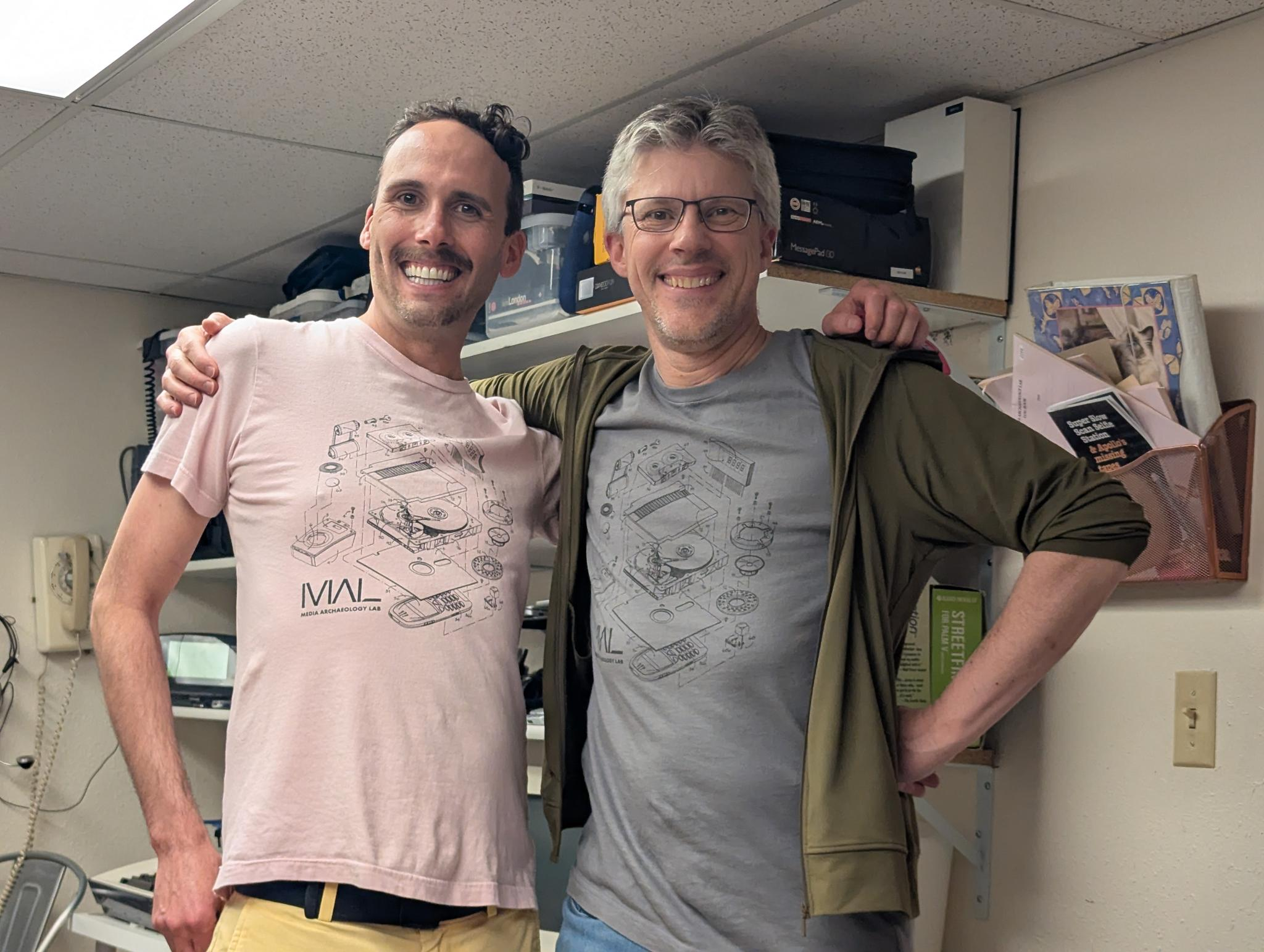 MAL Pals Eric and Chris wearing matching MAL tshirts in the lab