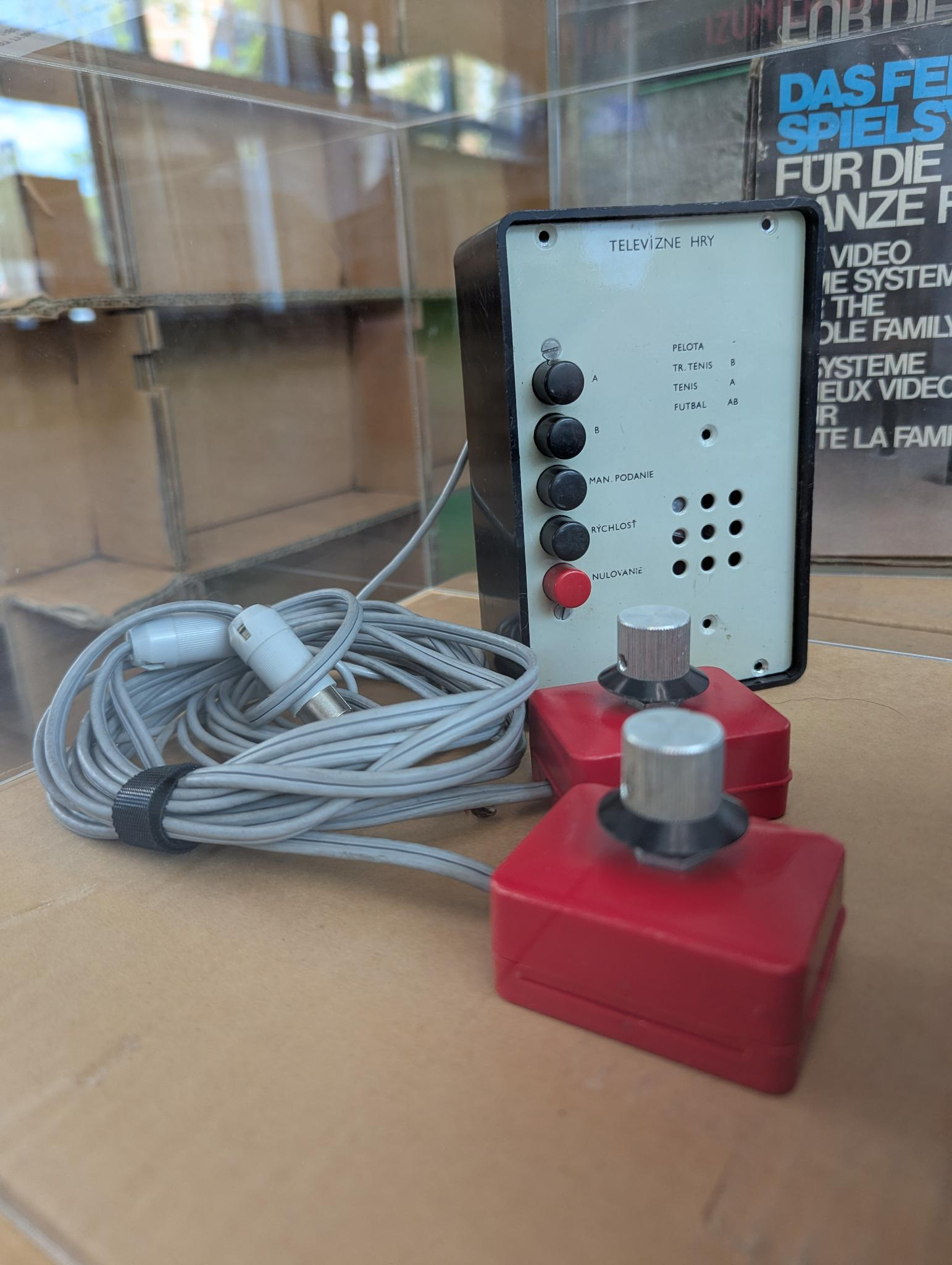 Pong clone, with red and silver paddles and a black and white box