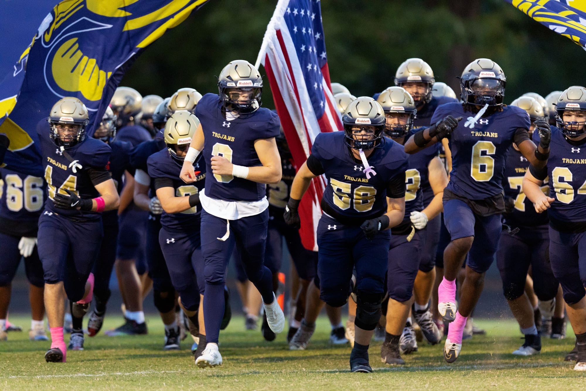High school football: Trojans' turnaround is picking up steam