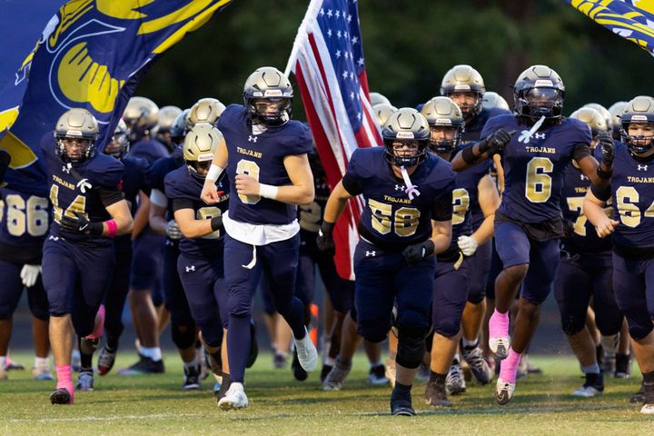 High school football: Trojans' turnaround is picking up steam