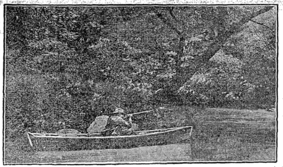 Archer Hazzler enjoying a lovely morning in the park on a boat with his rifle.