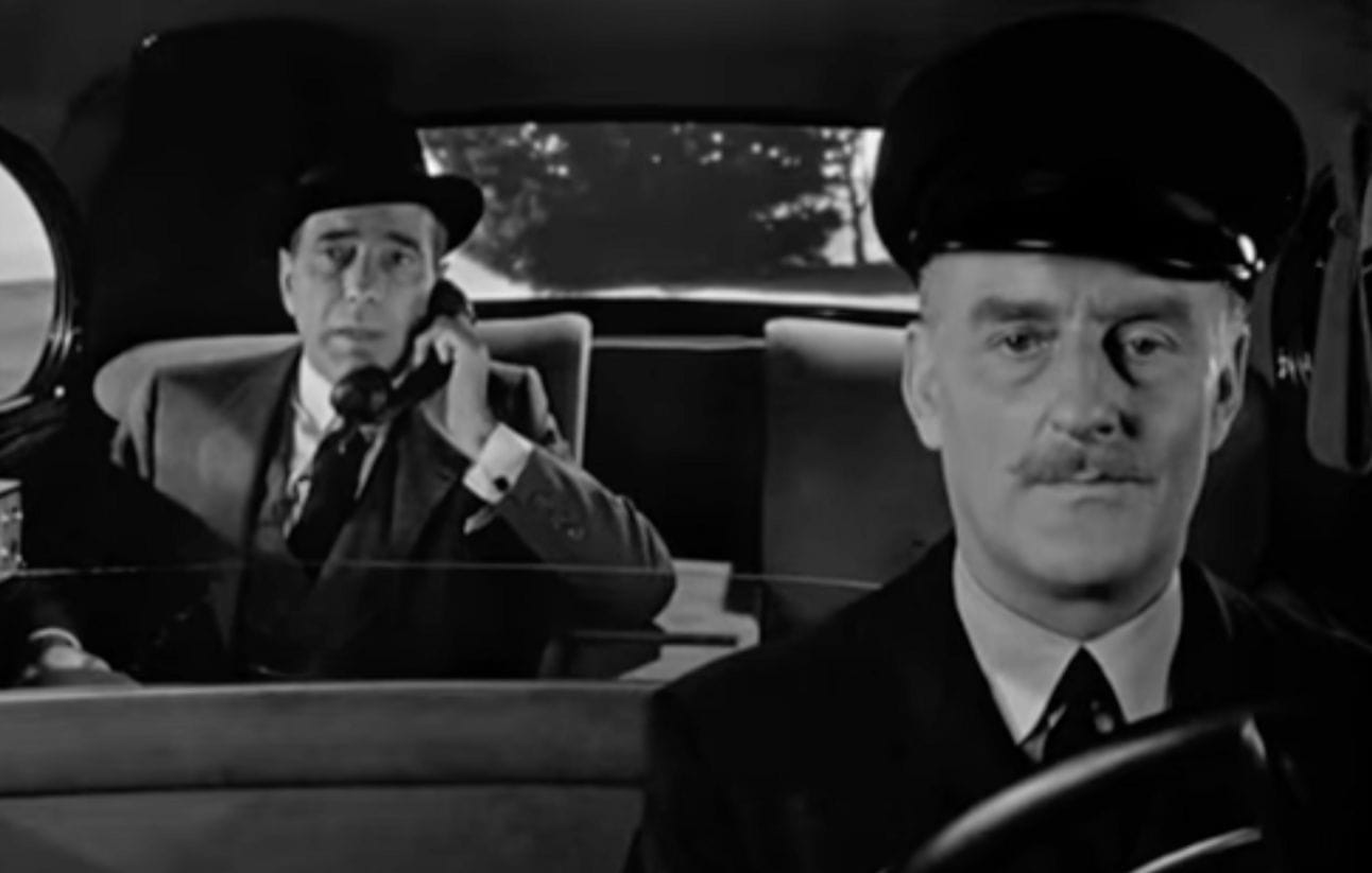 Humphrey Bogart uses a car phone in “Sabrina” (1954)