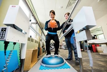 DCMC Rehab staff with rehab patient