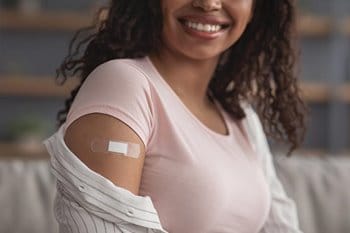 Woman getting vaccine
