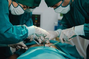 Surgeons starting organ transplant surgery