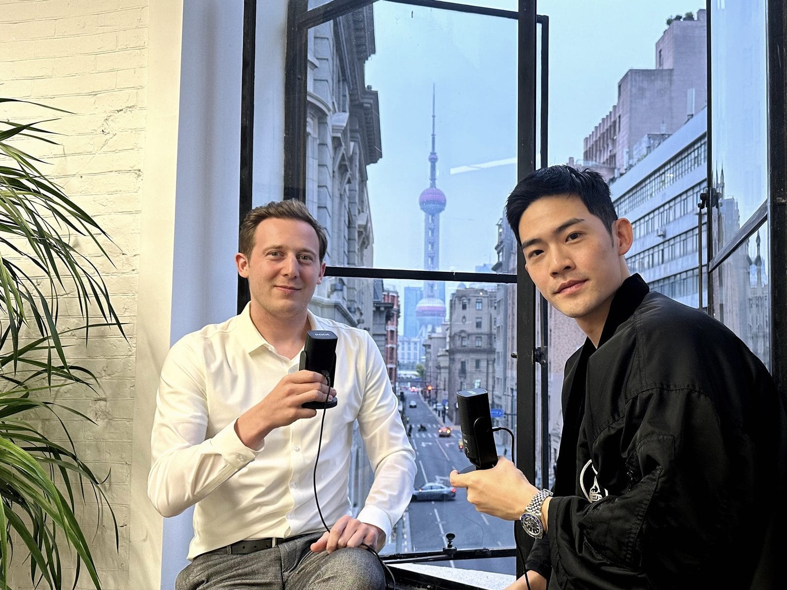 Martin Zhang recording in Shanghai with the Oriental Pearl Tower in view