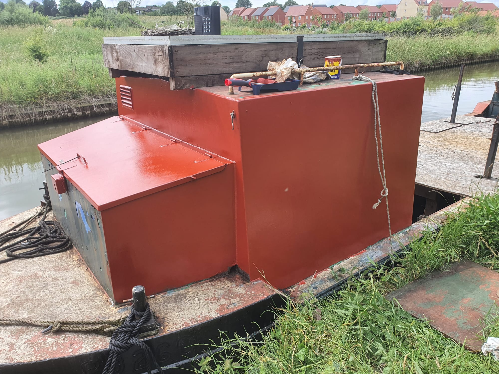 A boat cabin painted in red undercoat