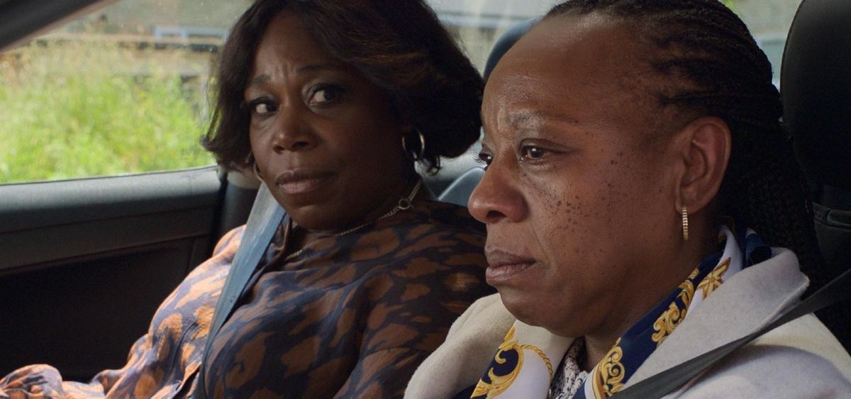 Michele Austin and Marianne Jean-Baptiste sit in a car in a still from the film Hard Truths